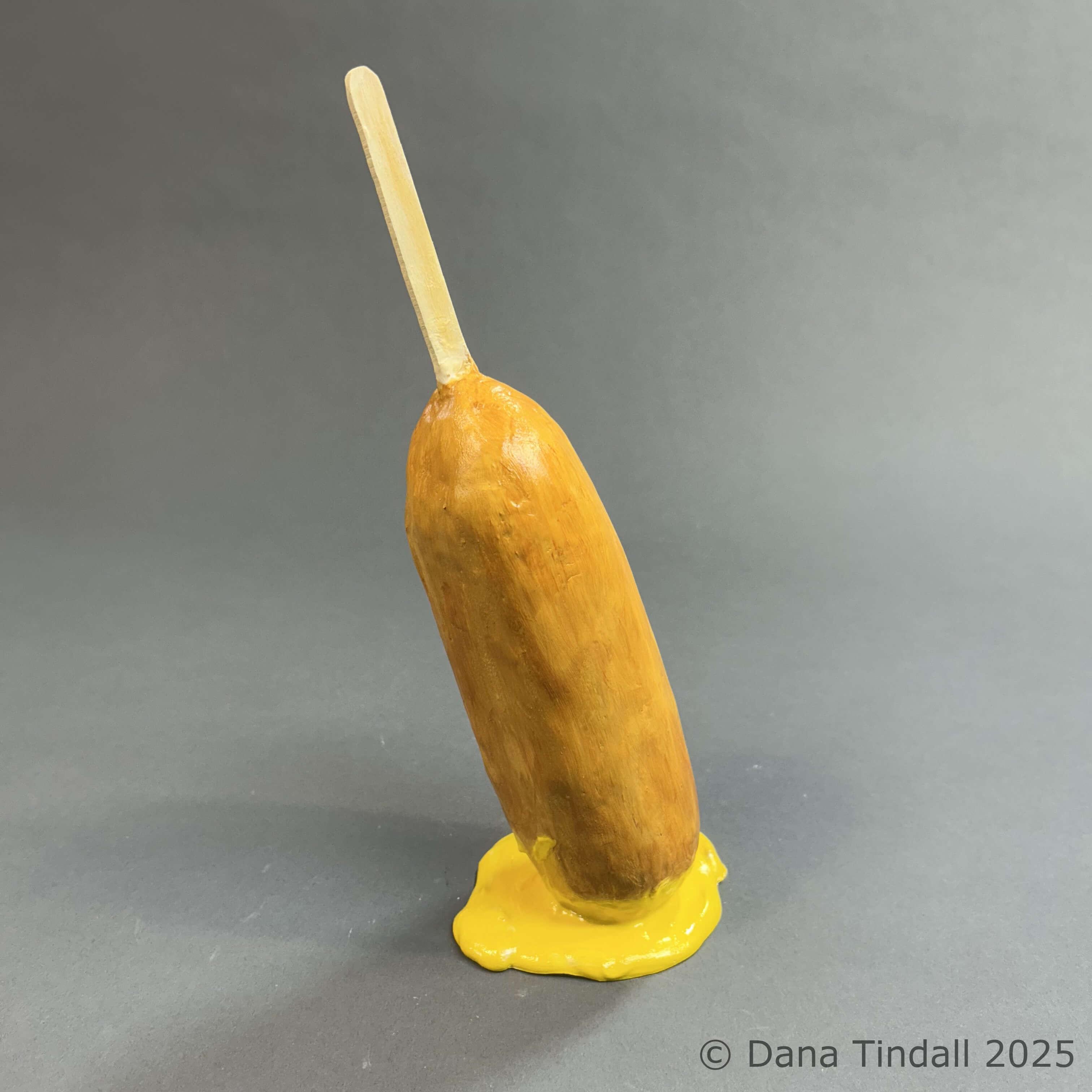 Corndog with MustardApprox 10” x 4” x 4” Mixed media